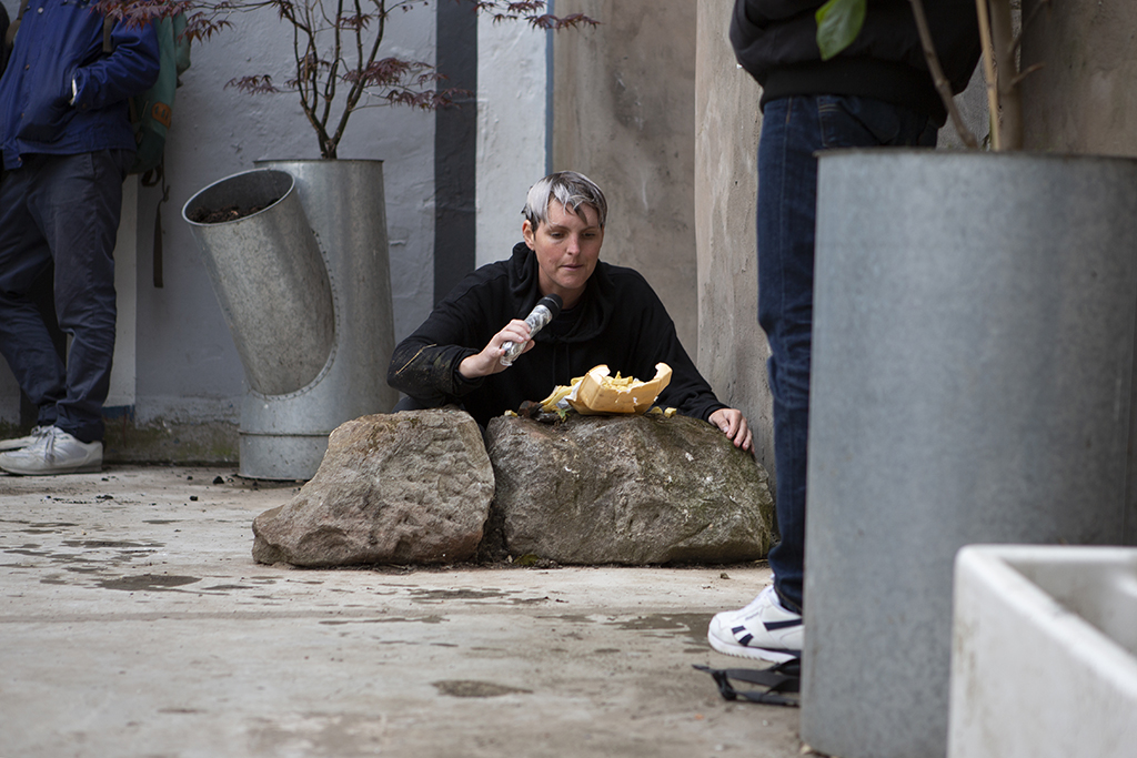 I'm sitting cross legged in front of a box of take away chips