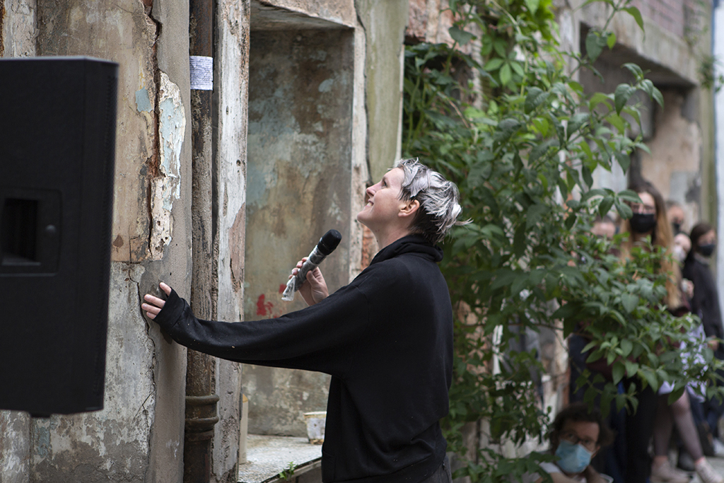 I'm reading from a script stuck on a drain pipe way above eye level